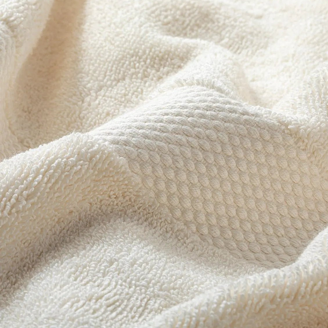 Close-up of a textured beige Premium Turkish Cotton towel