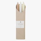 A set of white, beige, and brown tapered candles | Duman Home
