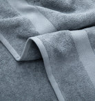 Close-up of a textured blue Premium Turkish Cotton towel with a soft finish
