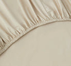 Close-up of a beige fitted sheet