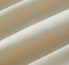 Close-up of beige sheet set fabric with a soft texture