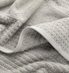 Close-up of light gray waffle towel fabric