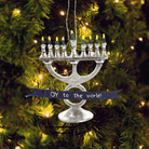 Menorah ornament with lit candles on a Christmas tree | Duman Home