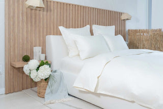 Signature Hemstitch Organic Sham shown in Bed | Duman Home