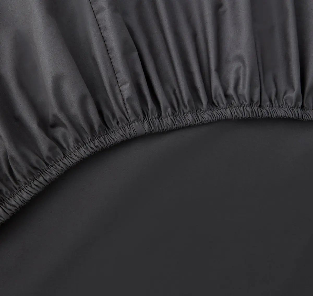 Close-up of a slate gray fitted sheet 