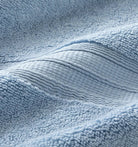 Close-up of a textured blue super plush towel 