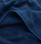 Close-up of a navy blue super plush towel with texture details